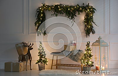 Beautiful Christmas themed photo zone with fir decor Stock Photo