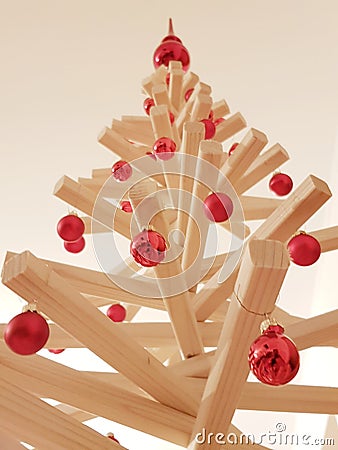 A beautiful Christmas wooden tree with red ball Stock Photo