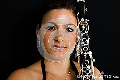 Beautiful clarinetist women Stock Photo