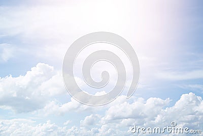 Beautiful clear blue sky background with plain large white cloud on morning time rays sunlight. Stock Photo