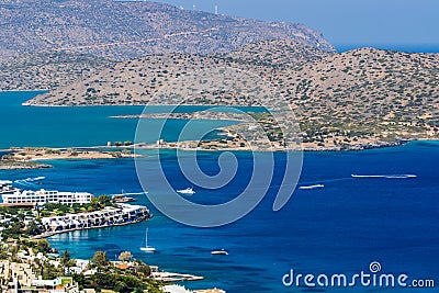 Beautiful clear ocean and resorts in the town of Elounda, Crete, Greece Stock Photo