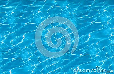 Beautiful clear pool water reflecting in the sun Stock Photo