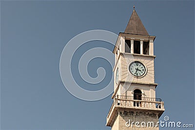 Tirana, Albania, August 2013. Beautiful clock tower in the center of the capital of the country as the basis of the background. Stock Photo