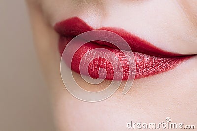 Beautiful closeup female plump lips with bright color makeup Stock Photo