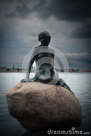 Beautiful closeup shot of a little mermaid statue in Copenhagen Editorial Stock Photo