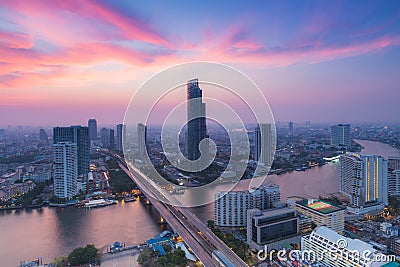 Beautiful cloud background, Modern Business Building along the river curve in Bangkok city Stock Photo