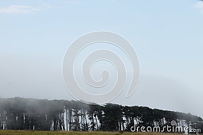 Beautiful clouds crashing on the coast of Monterey, California Stock Photo