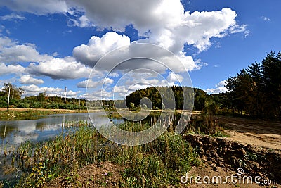 Beautiful clouds over the lake in Lytkarino Stock Photo