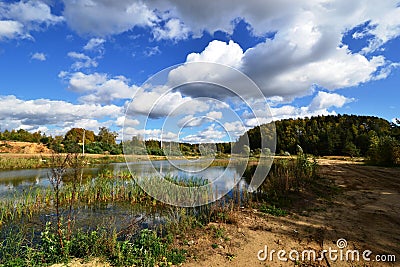 Beautiful clouds over the lake in Lytkarino Stock Photo