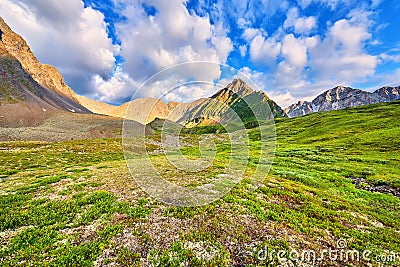 Beautiful clouds over mountain tundra Stock Photo