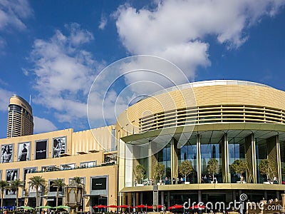Beautiful cloudy day and blue sky outside Dubai Mall Editorial Stock Photo