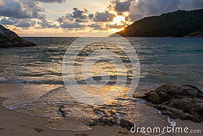 Beautiful cloudy sunset in Nai Harn bay, Phuket Stock Photo