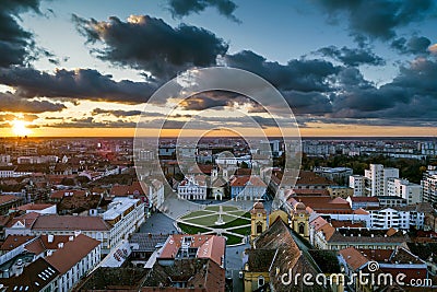 Beautiful cloudy sunset over Union Square - Piata Unirii Timisoara. Stock Photo