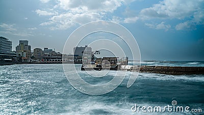 Beautiful coastline with boats resting on the sandy beach Stock Photo