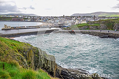 Beautiful coastline with the seaside town of Peel, Isle of Man Stock Photo