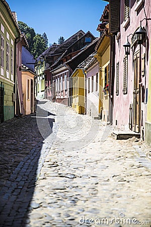 Beautiful cobblestone street in Romania in vertical format Stock Photo