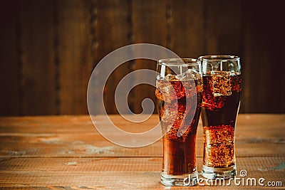 Beautiful cold fizzy cola soda with cubes ice Stock Photo