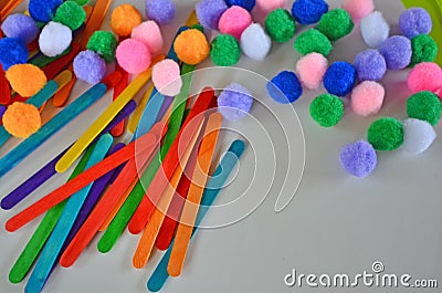 Beautiful colored sticks and flannel balls for kindergarten children practice Stock Photo