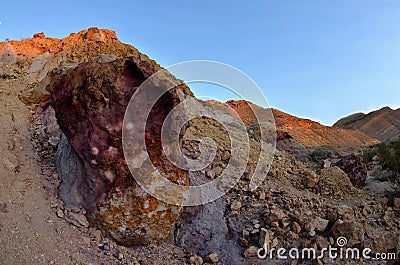 Beautiful colored violet and orange rocks of Yeruham wadi,Middle East,Israel,Negev desert Stock Photo