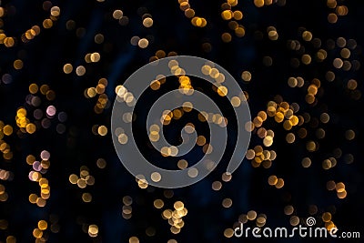 Beautiful and colorful bokeh lights on a black background - blurry backgrounds, lights at night Stock Photo