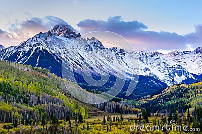 Beautiful and Colorful Colorado Rocky Mountain Autumn Scenery. Mt. Sneffels in the San Juan Mountains at Sunrise Stock Photo