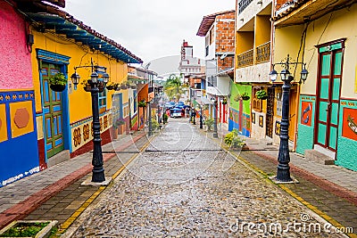 Beautiful and colorful streets in Guatape, known as town of Zocalos. Colombia Stock Photo