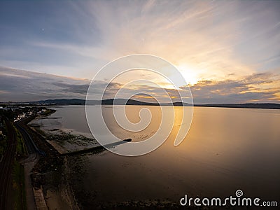 Beautiful colorful sunset above coast of Irish Sea in Holywood Northern Ireland. Stock Photo