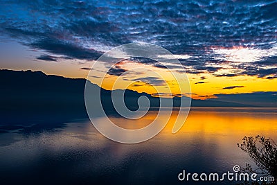Beautiful colorful sunset in the autumn above the French Alps an Stock Photo