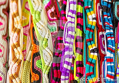 Beautiful and colorful woven handmade bracelets sale in Ecuador Stock Photo