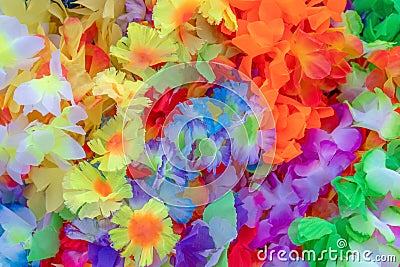 Beautiful colors of plastic flowers. colorful flowers can be used as a perfect background image. Decorative Stock Photo