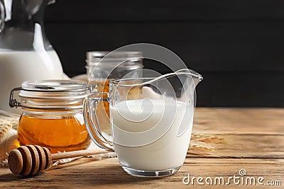 Beautiful composition with milk and honey Stock Photo