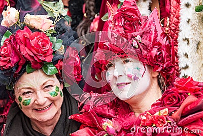 Costumed senior women with handmade dress full of roses and hearts at carnival in Zurich Editorial Stock Photo