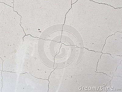 Concrete in cracks or cracks in plaster Stock Photo