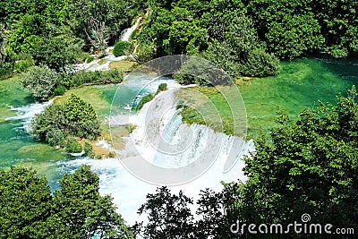 Beautiful Croatian Waterfall with intense green colour near krka in summer Stock Photo