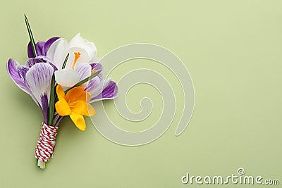 Beautiful crocus bouquet on beige background, top view. Space for text Stock Photo