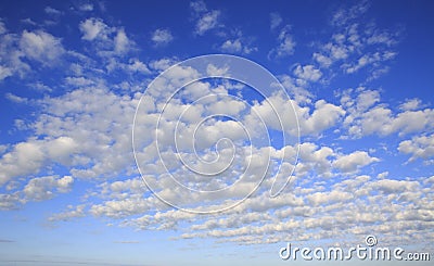 Beautiful cumulus cirrus clouds in blue sky Stock Photo