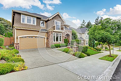 Beautiful curb appeal of American house with stone trim Stock Photo