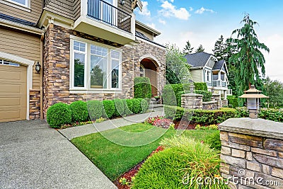 Beautiful curb appeal of American house with stone trim Stock Photo