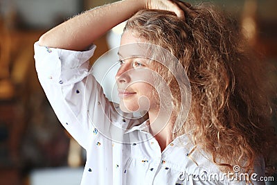 Beautiful curly-haired quiet girl Stock Photo