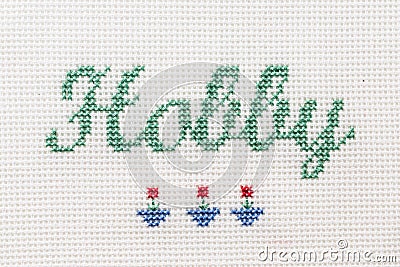 Beautiful cute miniature embroidery word Hobby Stock Photo