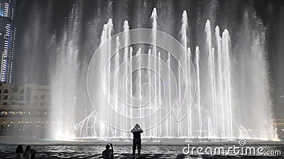 Beautiful dancing fountains in Dubai in night time. Editorial Stock Photo