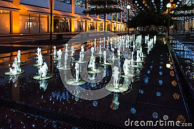 Beautiful dancing fountains at night as an abstract background , Nice Editorial Stock Photo