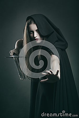 Beautiful dark woman in fighting position Stock Photo