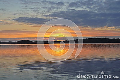 A beautiful dawn, the sun goes below the horizon, and dusk comes. Stock Photo