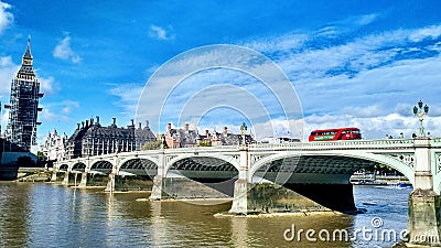 London cityscape with Big Ben, Westminster Bridge, and classic double-decker. Editorial Stock Photo