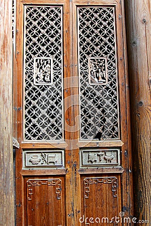 Beautiful decorated wooden doors in Hongcun, China Stock Photo