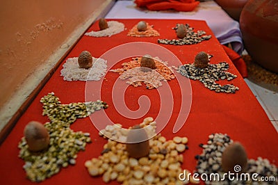 Beautiful decoration of supari, betalnut, areca nut, pulses, rice for worship of indian god Stock Photo