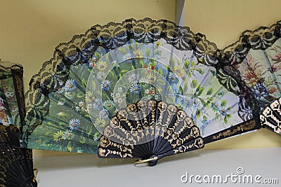 Beautiful souvenir fan on the market in Thailand Stock Photo