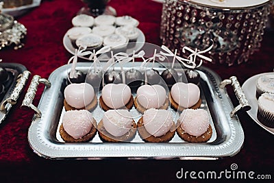 Beautiful delicious heart shaped cakes, pink color. Stock Photo