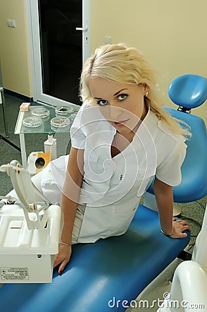 Beautiful dentist in medical office Stock Photo